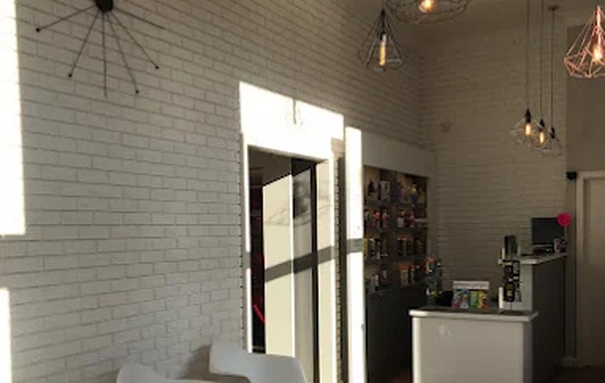 Comfortable modern tanning studio interior with warm lighting